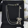 18K  Chanel 25K Bow Tie Diamond Gold Necklace